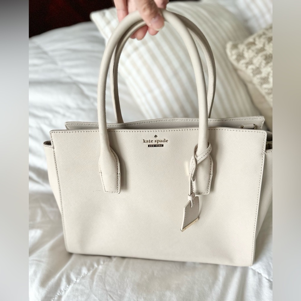 Kate Spade beautiful and gently used light cream color